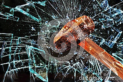 Hammer Through Window. Stock Photo