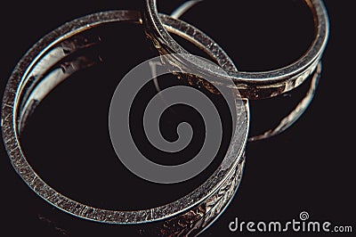 Hammered weddin rings. sunsine Stock Photo