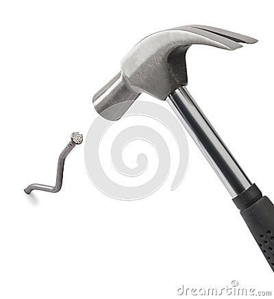 Hammering a crooked nail Stock Photo