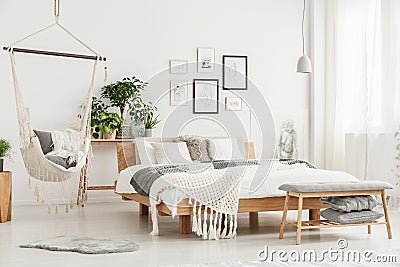 Hammock in bright bedroom Stock Photo