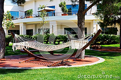 The hammock is on lawn in luxury hotel Stock Photo