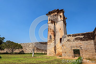 Zanana Enclosure with watch tower in back under blue cloudscape. Hampi, Karnataka, India Editorial Stock Photo