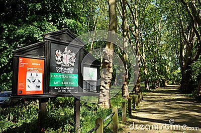 Hampstead Heath is a large, ancient London heath embracing ponds woodlands lido playgrounds and training track Editorial Stock Photo