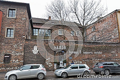 Hamsa Israeli restaurant facade in Kazimierz Jewish district. Krakow, Poland. Editorial Stock Photo