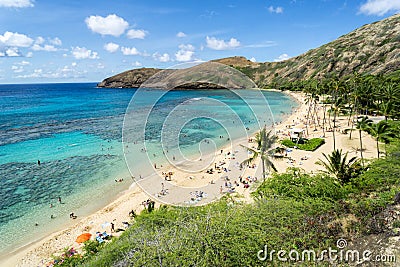 Hanauma Bay Beach, Oahu Hawaii filled with vacationers and snorkeling Stock Photo