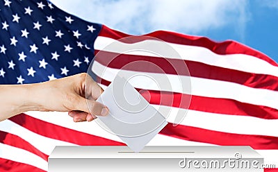 Hand of american with ballot and box on election Stock Photo