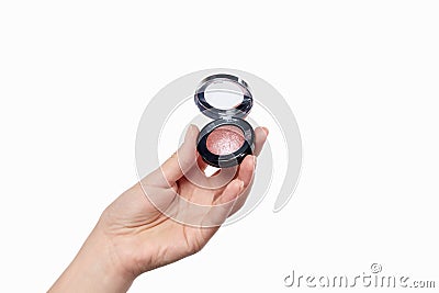 Crop hand with pink eyeshadow Stock Photo