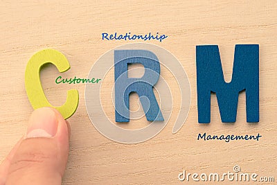 Hand arrange letters as CRM Stock Photo