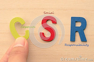 Hand arrange letters as CSR Stock Photo