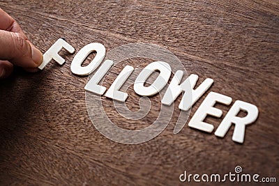 Follower Wood Letters Stock Photo