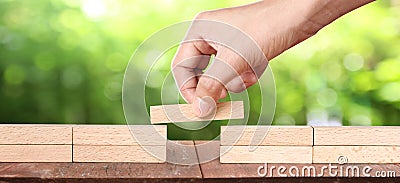 Hand arranging wood block . Business concept growth Stock Photo