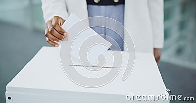 Hand, ballot and box for vote paper at president election cast, poll station choice or government selection. Person Stock Photo
