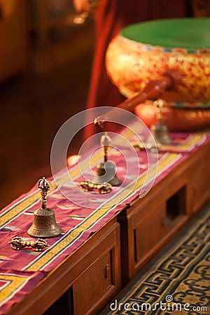 Hand bells and a dorje on a little tables Stock Photo