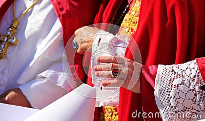 hand of a bishop in clerical dress blessing the faithful Stock Photo