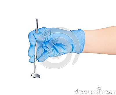 Hand in blue glove holding dental tool Stock Photo