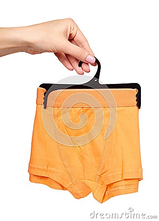 Hand with bright boxer underwear, cotton pants Stock Photo