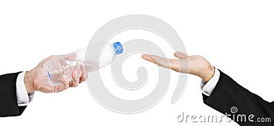 Hand of businessman holding, giving, receiving bottle of water, isolated on white background Stock Photo