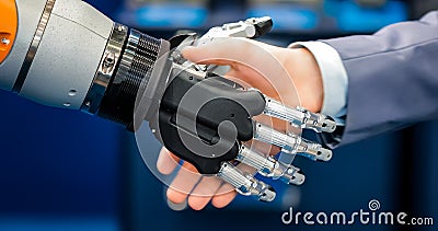 Hand of a businessman shaking hands with a droid robot. The concept of human interaction with artificial intelligence. Stock Photo