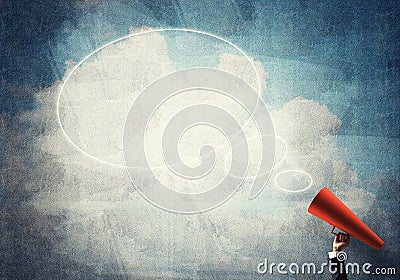 Hand of businesswoman holding red paper trumpet and speech cloud Stock Photo