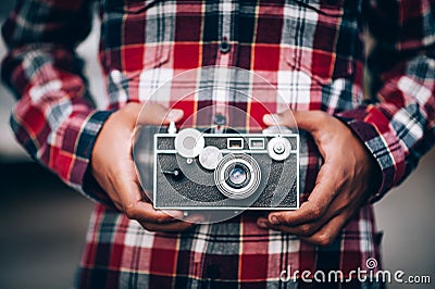 Hand and camera and travel Stock Photo