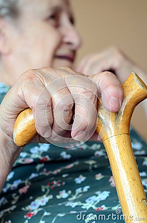 Hand on cane Stock Photo