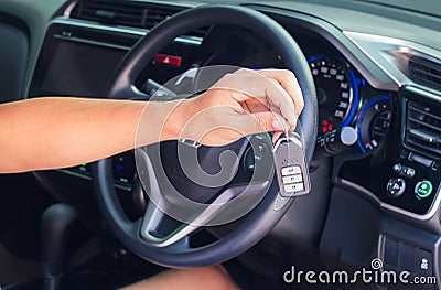 Hand with a car key. Stock Photo