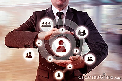 Hand carrying businessman icon network - HR,HRM,MLM, teamwork and leadership concept Stock Photo