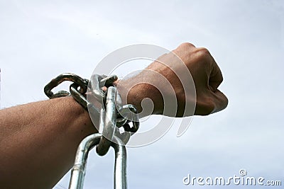 Hand in chain figthing for freedom Stock Photo