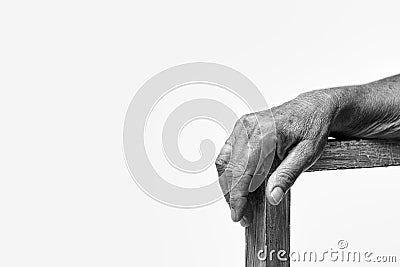 Hand on chair armrests Stock Photo