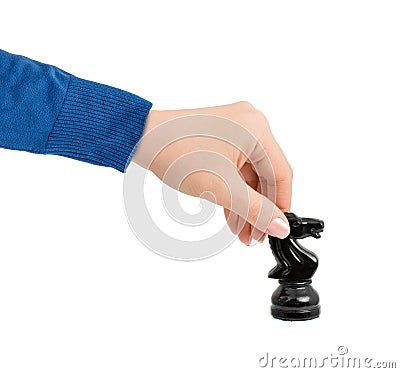 Hand with chess knight Stock Photo