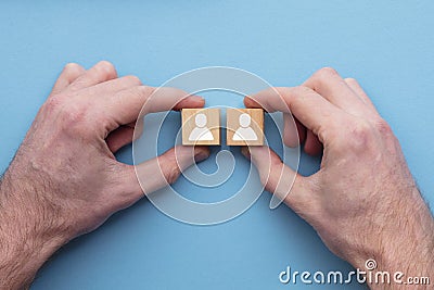 Hand choosing one person from another. Business choice concept Stock Photo