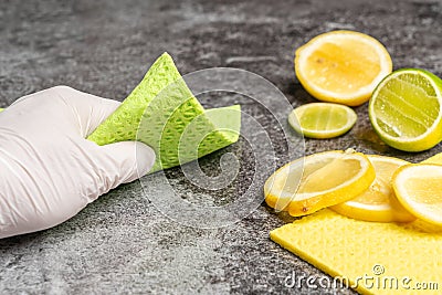 Cleaning the table with lemon biological cleaning agents Stock Photo