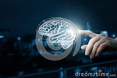 Hand clicks on the brain. Stock Photo