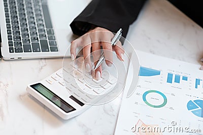 Hand Close up Smart Woman working in the garden office. Stock Photo