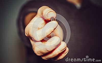 Man hand with coffee bean Stock Photo