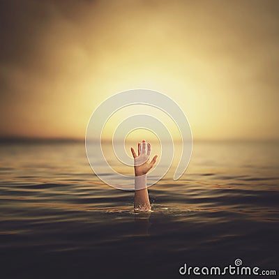 A hand coming out of the water Stock Photo