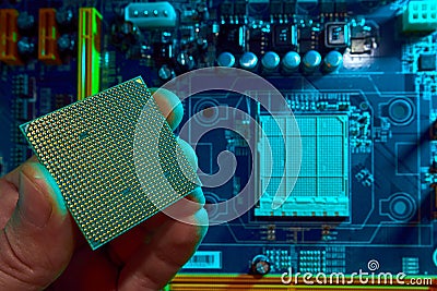Hand of computer engineer replace computer cpu change components into socket processor for maintenance Stock Photo