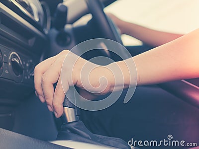 Hand control with auto part of vehicle Stock Photo