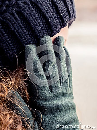 the hand covering the face of a girl who wishes to be unrecognizable or hiding her shame_ Stock Photo