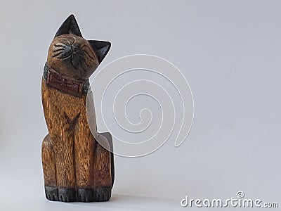 Hand craft wooden cat on white background. Stock Photo