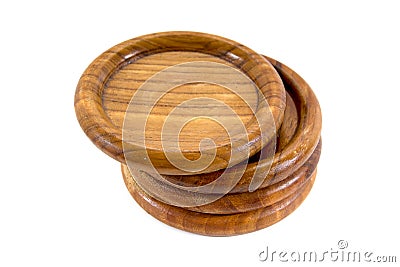 Four wood coaster isolated on white background. Wood saucer isolated. Wood glass tray background. Stock Photo