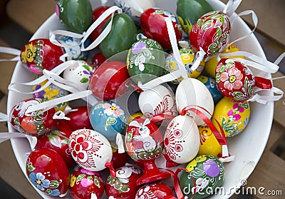 Hand crafted wooden easter eggs for decoration of various color Editorial Stock Photo