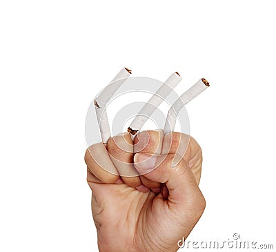 Hand crushing cigarettes Stock Photo