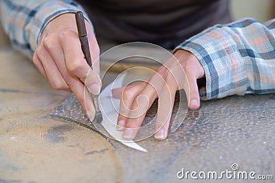 hand cutting pattern Stock Photo