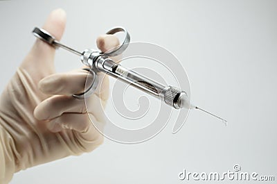 hand dentist doctor with carpool syringe for local anesthesia Stock Photo