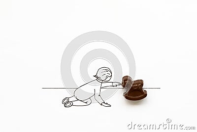 Hand drawing cute cartoon baby playing with toy rocking horse. Minimal, creative or food art concept. Copy space Stock Photo