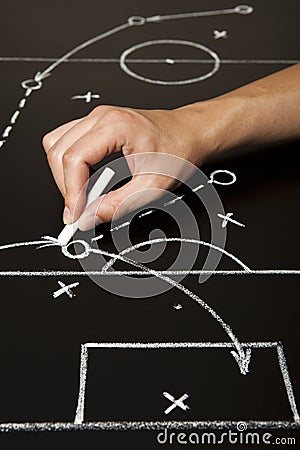 Hand drawing a soccer game strategy Stock Photo