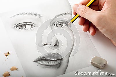 Hand Drawing a Woman Face Stock Photo