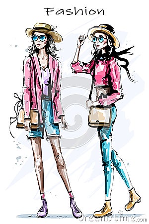 Hand drawn beautiful young girls in hats. Two stylish women. Fashion woman look. Vector Illustration