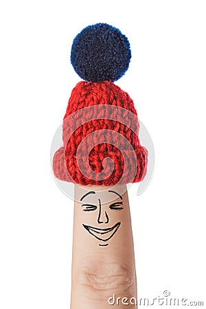 Hand-drawn face on finger Stock Photo